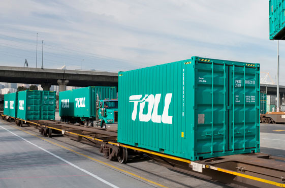 Unloading containers from a Toll truck