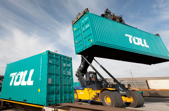 Unloading containers from a Toll truck